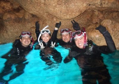 Group of Scuba Divers at Blue Cave