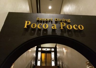 Poco A Poco Sign