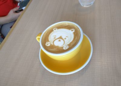 Bear design in cup of coffee